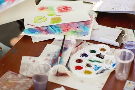 kids  draw with parents paint beautiful pictures, children's creativityの写真素材