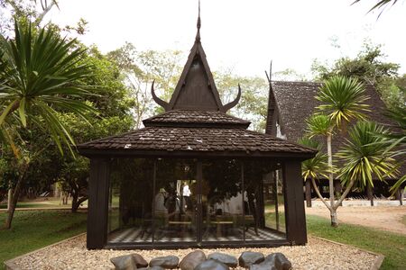 beautiful temple in thailand in tropical treesの写真素材