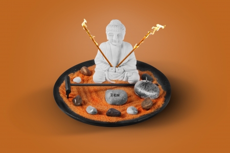 Buda zen con piedras en platoの写真素材