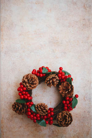 Christmas wreath on rustic backgroundの写真素材