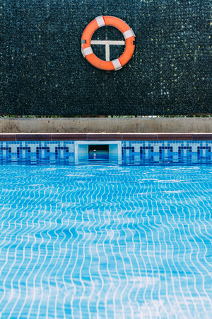 Lifeguard on swimming poolの写真素材