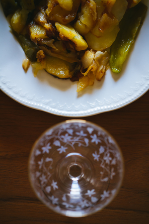 Dish with potatoes and peppersの写真素材