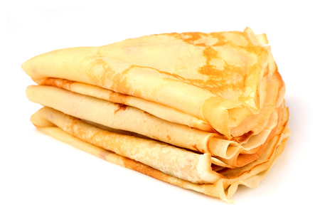 Thin pancakes folded stack.Isolated on white background.の写真素材