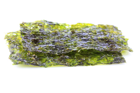 Crispy dried seaweed nori isolated closeup on white background.の写真素材