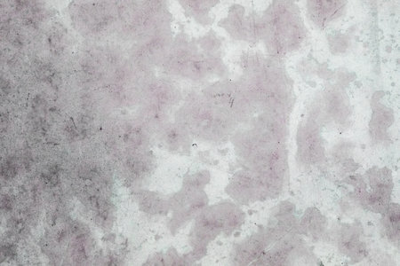 Stained concrete backdrop with pinkの写真素材