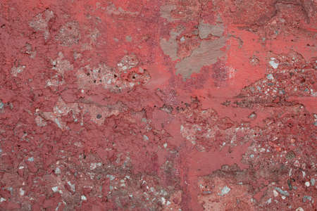 Red coral painted concrete wall textureの写真素材