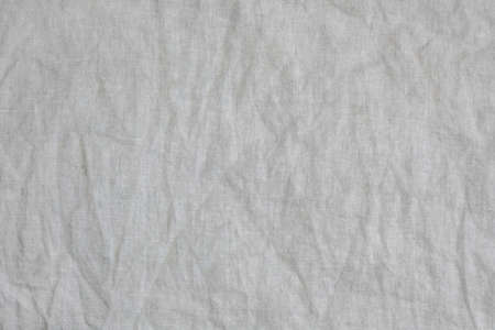 Wrinkled natural linen texture backdropの写真素材