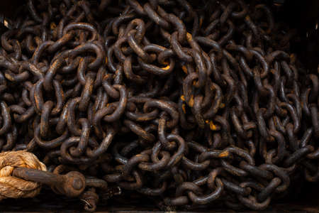 Metal anchor chain on the boatの写真素材