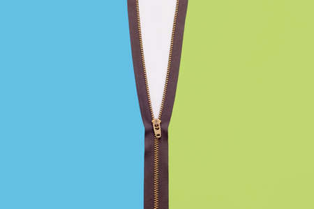Zipper connecting two colored sidesの写真素材