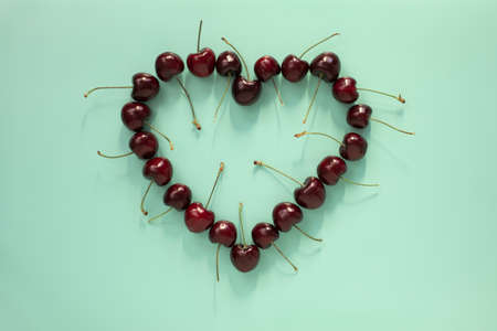 Cherry heart on aqua blueの写真素材