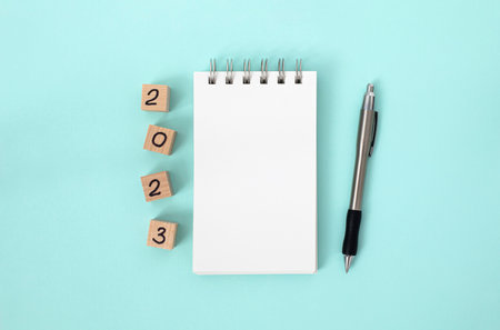 2023 year blank notepad with a pen