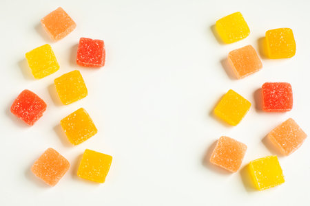 Pieces of fruit jelly on whiteの写真素材