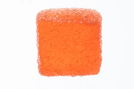 Orange square of fruit jelly