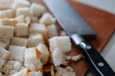 Bread squares closeup with a knifeの写真素材