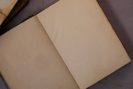 Open antique book with empty pagesの写真素材