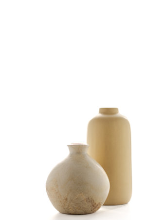 Minimalist Sand-Colored Vases on White Backlit Backgroundの写真素材