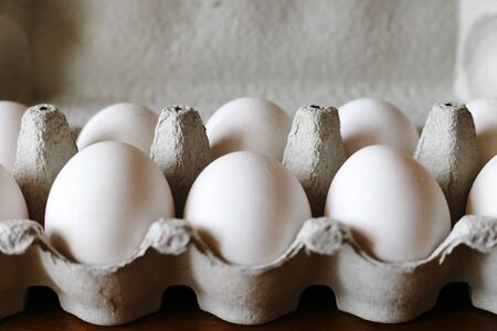 white chicken eggs in a tray