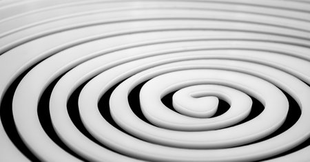 Simple white spiral on black backgroundの写真素材