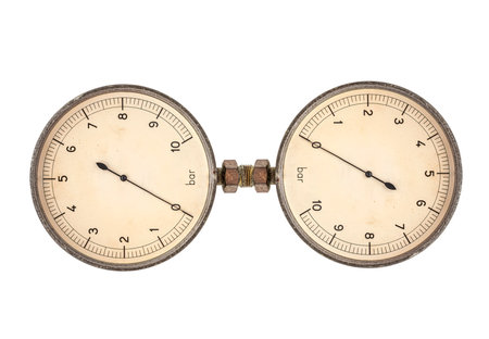 two Old vintage pressure gauge on a white background