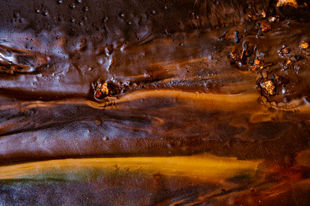 colored mud river, close viewの写真素材