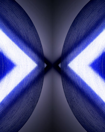 glowing triangular led blue light and dark circle, top viewの写真素材