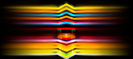 light through Stack of different colours Cast Acrylic Sheet with motion blur effect on black...