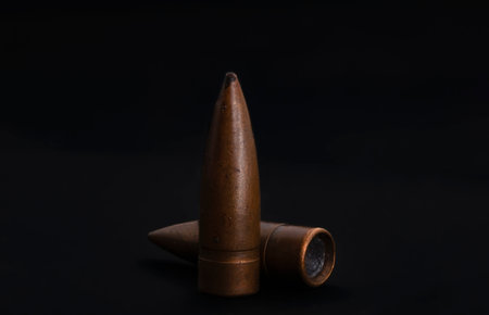 macro shoot of 7.62 caliber bullet on a black isolated backgroundの写真素材
