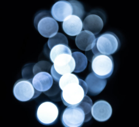Abstract defocused lights on dark background