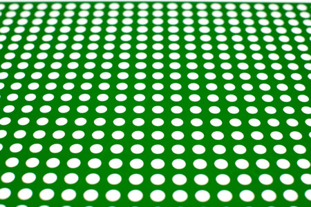 white dots on a green backgroundの写真素材