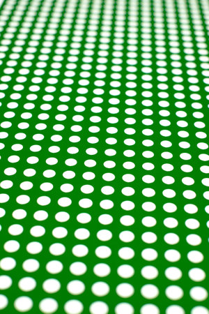 white dots on a green backgroundの写真素材