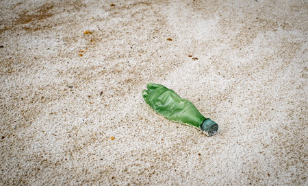 a plastic bottle on the beachの写真素材