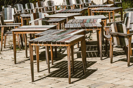 abandoned restaurant table and chairsの写真素材