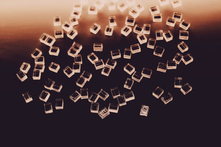 abstract plastic parallelepipedic shapes on a dark backgroundの写真素材