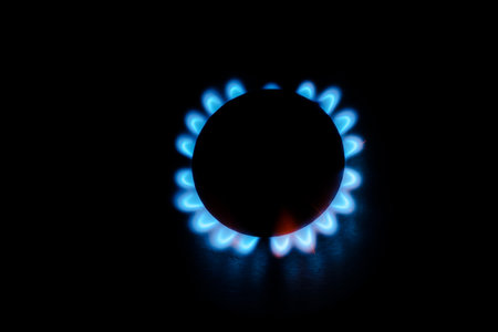 kitchen gas stove with blue flameの写真素材