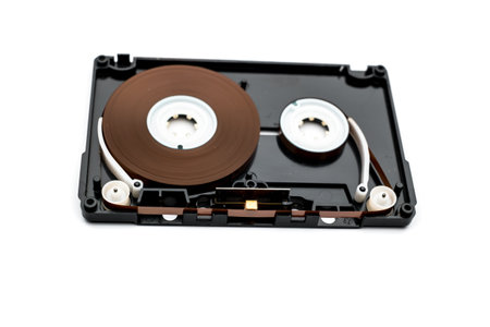 old black audio cassette tape on white background