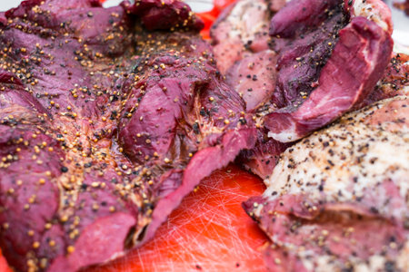 smoked pork with spices on the tableの写真素材