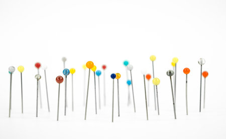 view of Colorful sewing pins plantedの写真素材