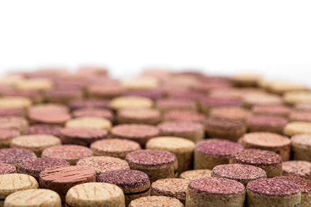 Old Used corks plugs on whiteの写真素材