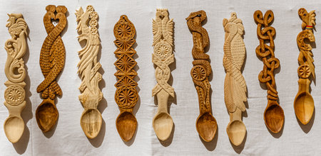 wooden spoons on the wallの写真素材