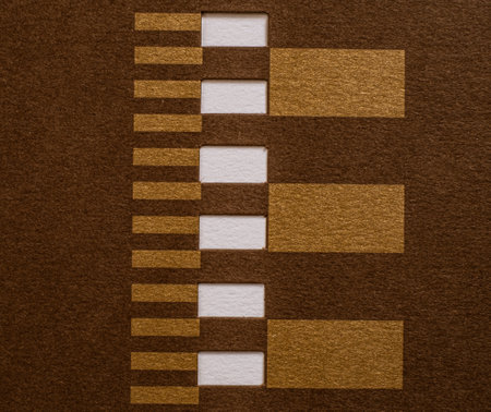 A dense industrial sheet of grey paper with a textured surface and geometric shapesの写真素材