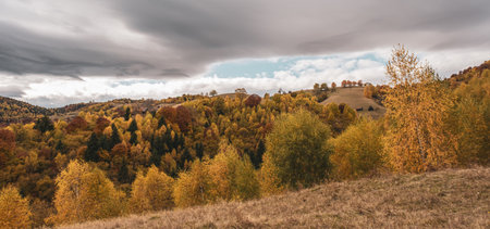 beautiful autumn landscapes in the Romanian mountains, Fantanele village area, Sibiu county, Cindrel mountains, Romaniaの写真素材