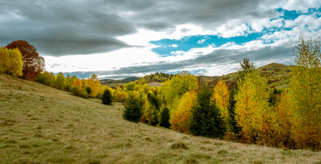 beautiful autumn landscapes in the Romanian mountains, Fantanele village area, Sibiu county, Cindrel mountains, Romaniaの写真素材