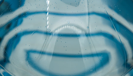 plastic bottle with water close up view