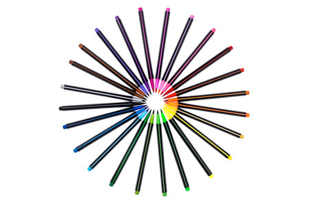 A set of bright multi-colored felt-tip markers lie in a circle,の写真素材