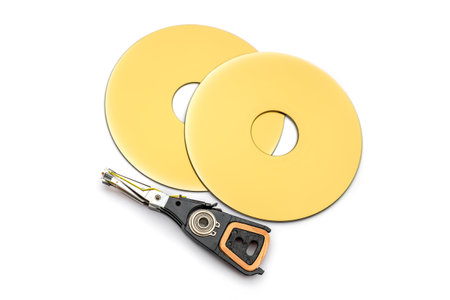 Detailed view of the disassembled, old hard disk driveの写真素材
