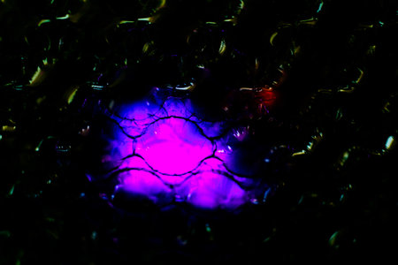 abstract background with purple and blue light spots, close-up