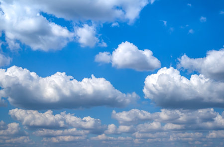 white fluffy clouds in the blue sky