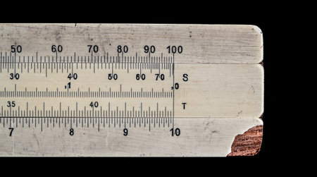 Old pocket slide rule mechanical calculatorの写真素材