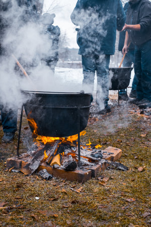 Romanian traditional food prepared at the cauldron on the open fire with wood, Christmas traditionの写真素材