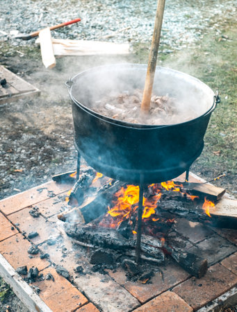 Romanian traditional food prepared at the cauldron on the open fire with wood, Christmas traditionの写真素材